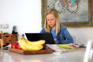 girl homeschooling